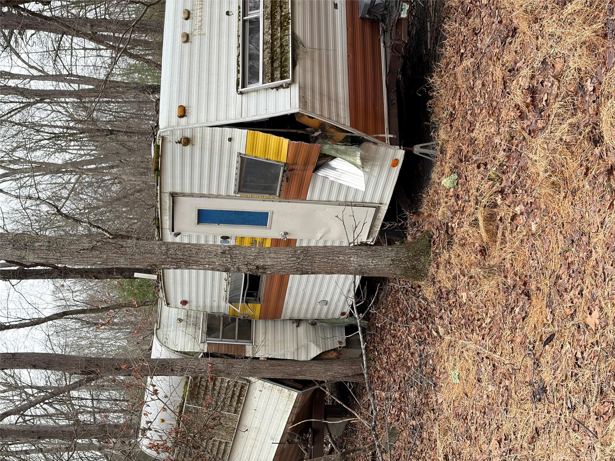 0 Red Hill Road Wurtsboro, NY 12790 - Photo 6 of 16 a view of a backyard with a car parked