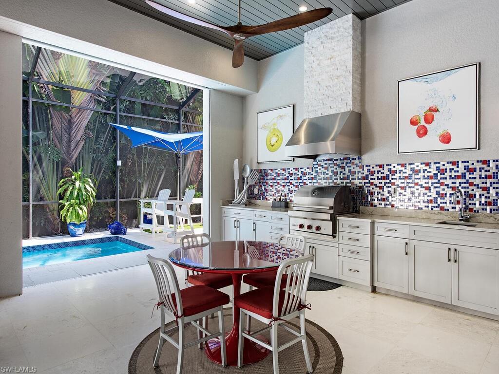 555 Mooring Line Drive Naples, FL 34103 - Photo 23 of 27 a view of a dining room with furniture and window