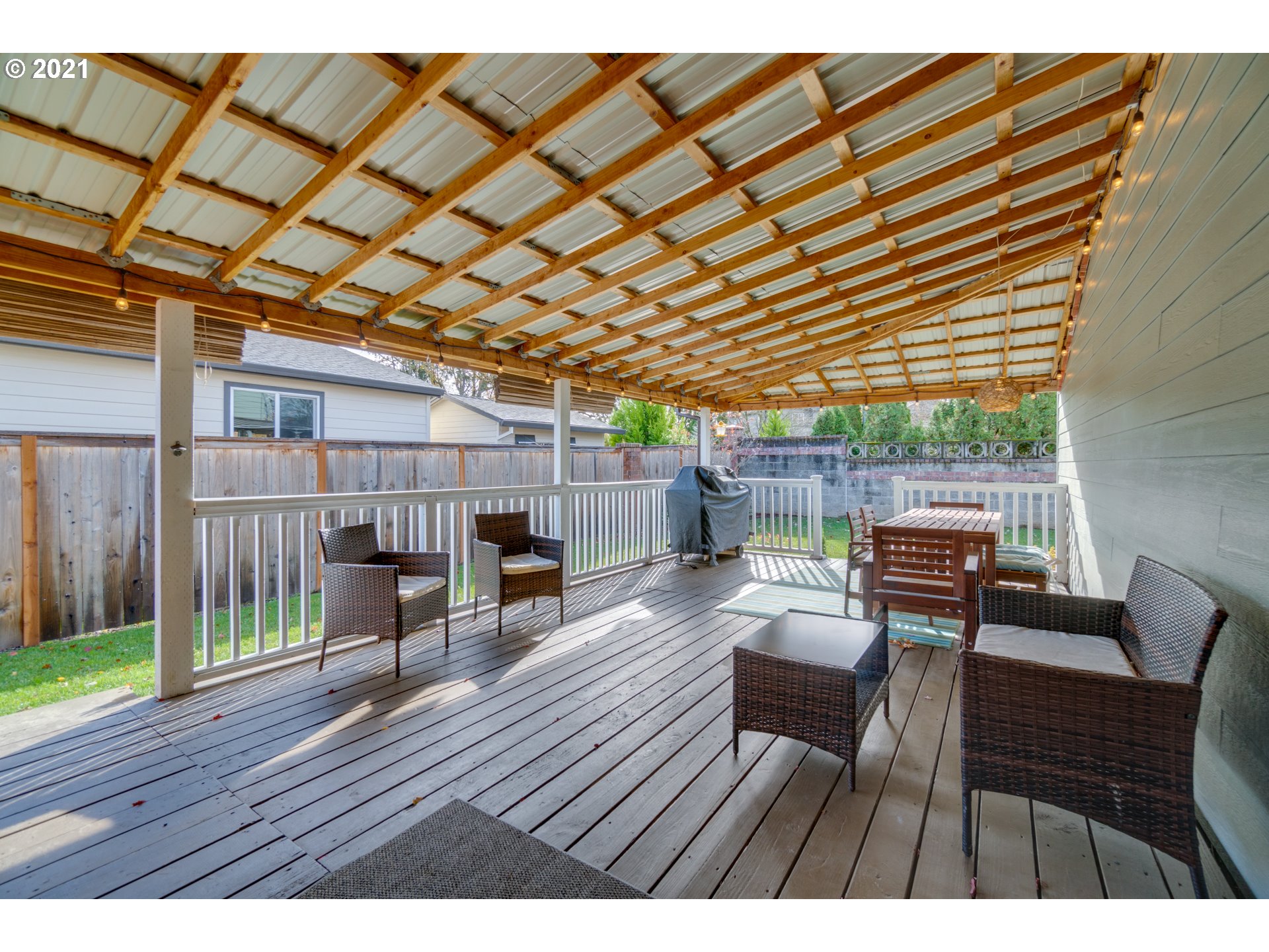 16934 Southwest Steele Way Beaverton, OR 97006 - Photo 24 of 27 a outdoor view with a sitting space and large trees