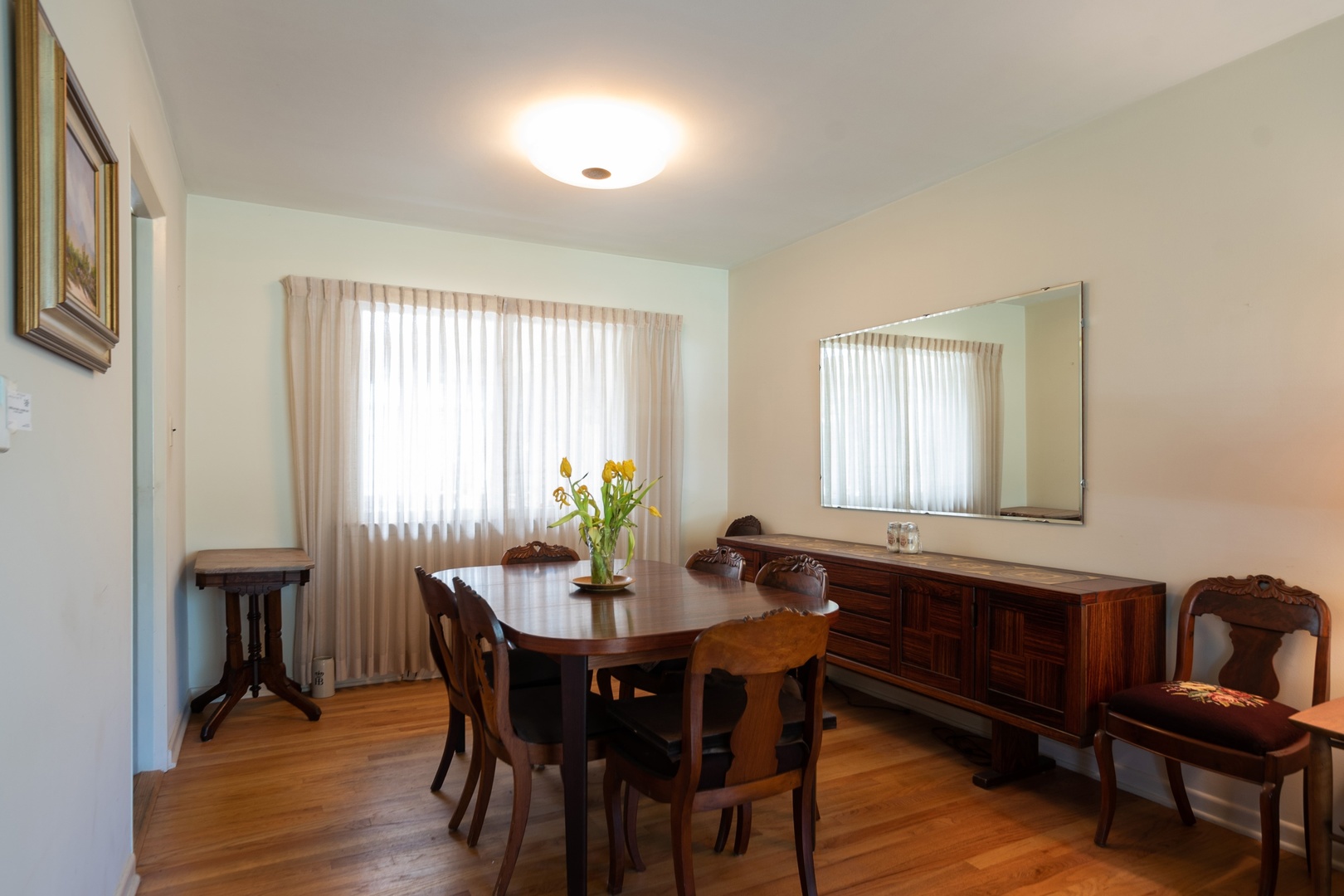 1218 Kenton Road Deerfield, IL 60015 - Photo 7 of 15 a view of a dining room with furniture and window
