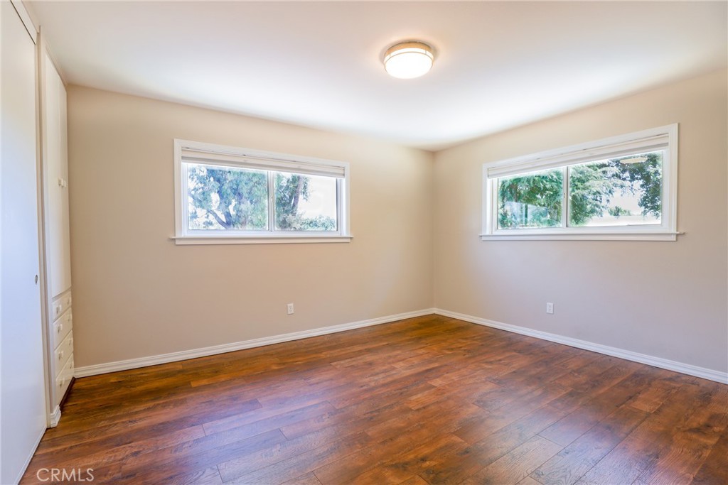3388 Ramona Road Atascadero, CA 93422 - Photo 21 of 55 Bedroom 2 is at the front of the home and has engineered hardwood floors.