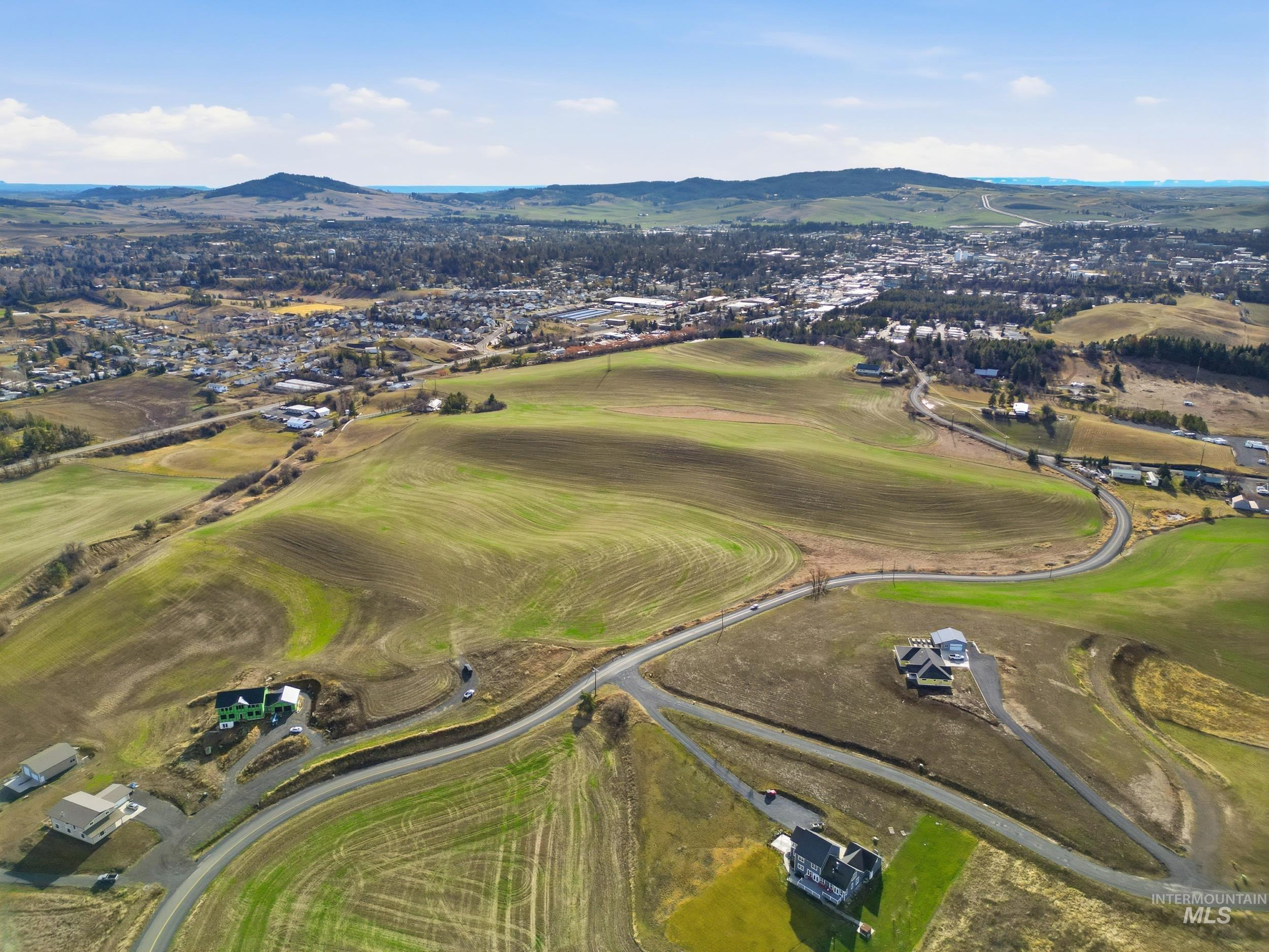 Tbd Mix Road Moscow, ID 83843 - Photo 13 of 40 Aerial view of property and surrounding area with a mountain backdrop