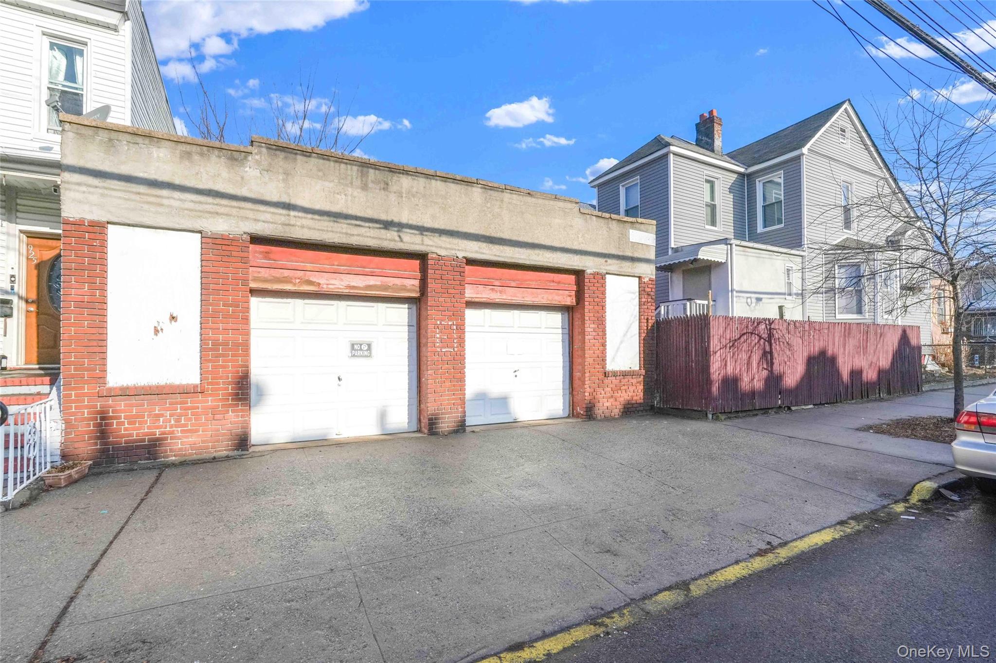 194 Crystal Street Brooklyn, NY 11208 - Photo 15 of 16 a view of a house with a snow in the yard