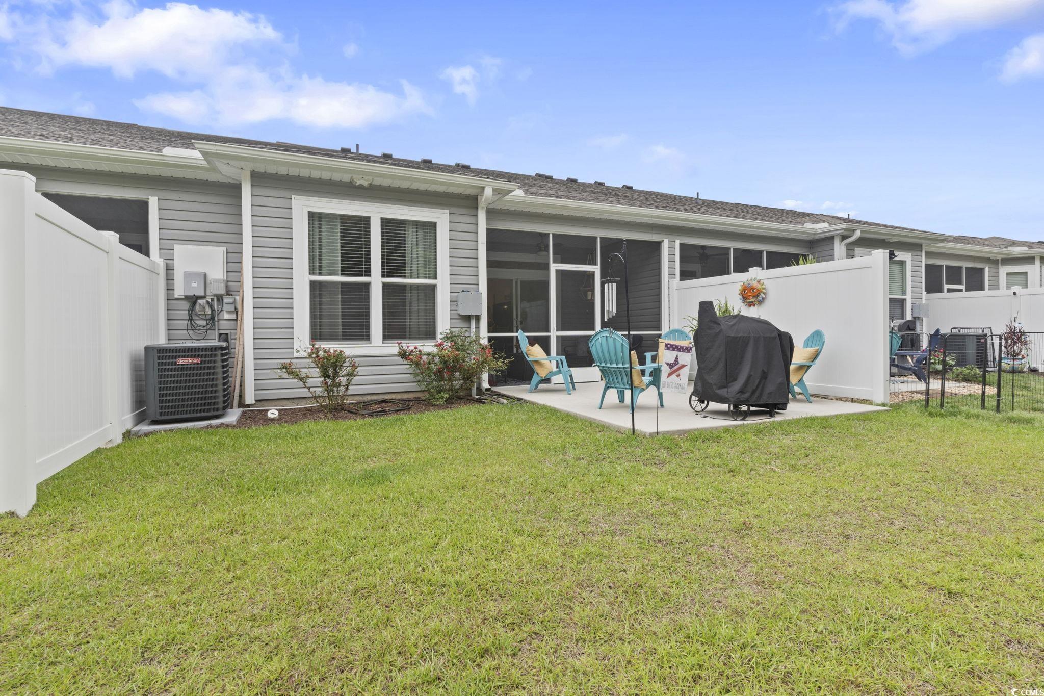 4027 Taranto Loop, Unit C Myrtle Beach, SC 29579 - Photo 24 of 36 Rear view of property featuring central air condit