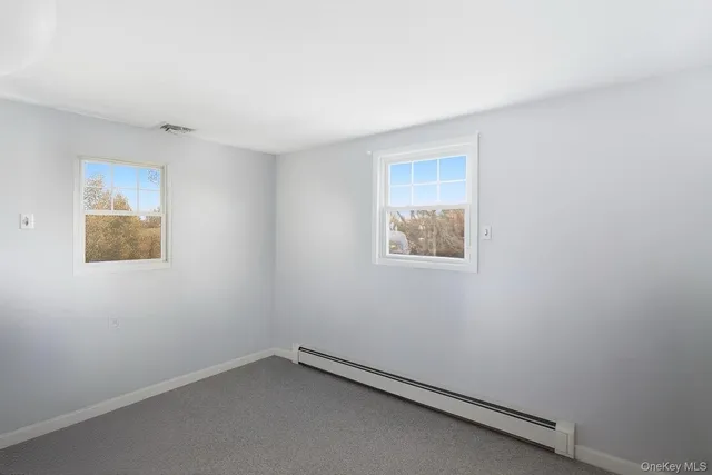 an empty room with a workbench