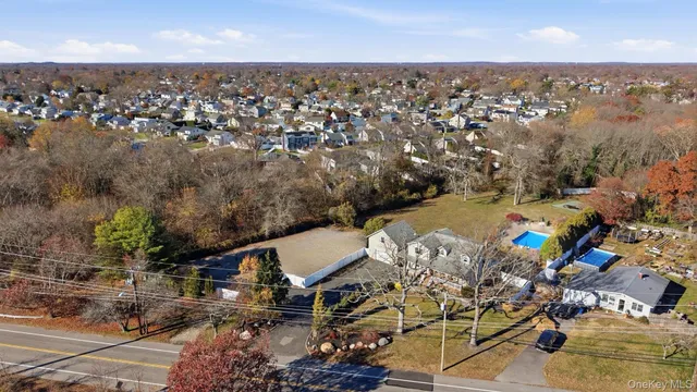 a view of outdoor space with wooden floor