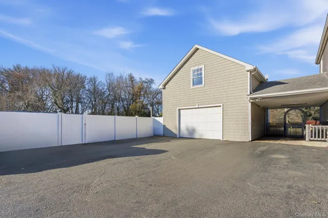 a view of a house with a garage