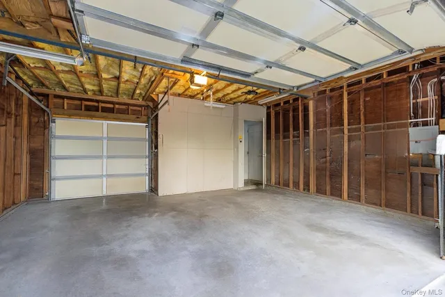 a view of an empty room with closet