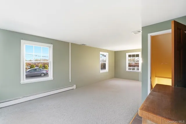a view of livingroom with furniture and window