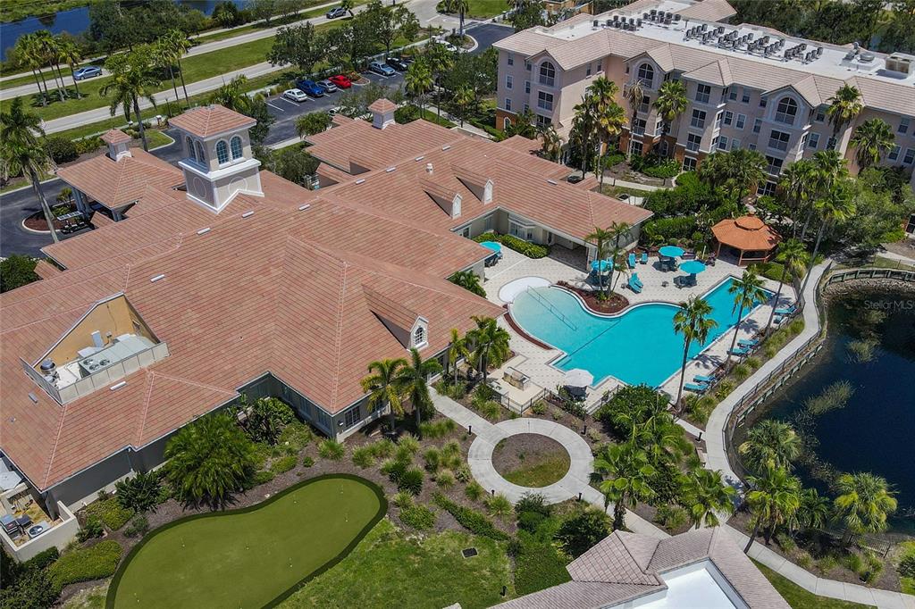 5000 Ibis Way, Unit 101 Venice, FL 34292 - Photo 24 of 39 an aerial view of a house with yard swimming pool and outdoor seating