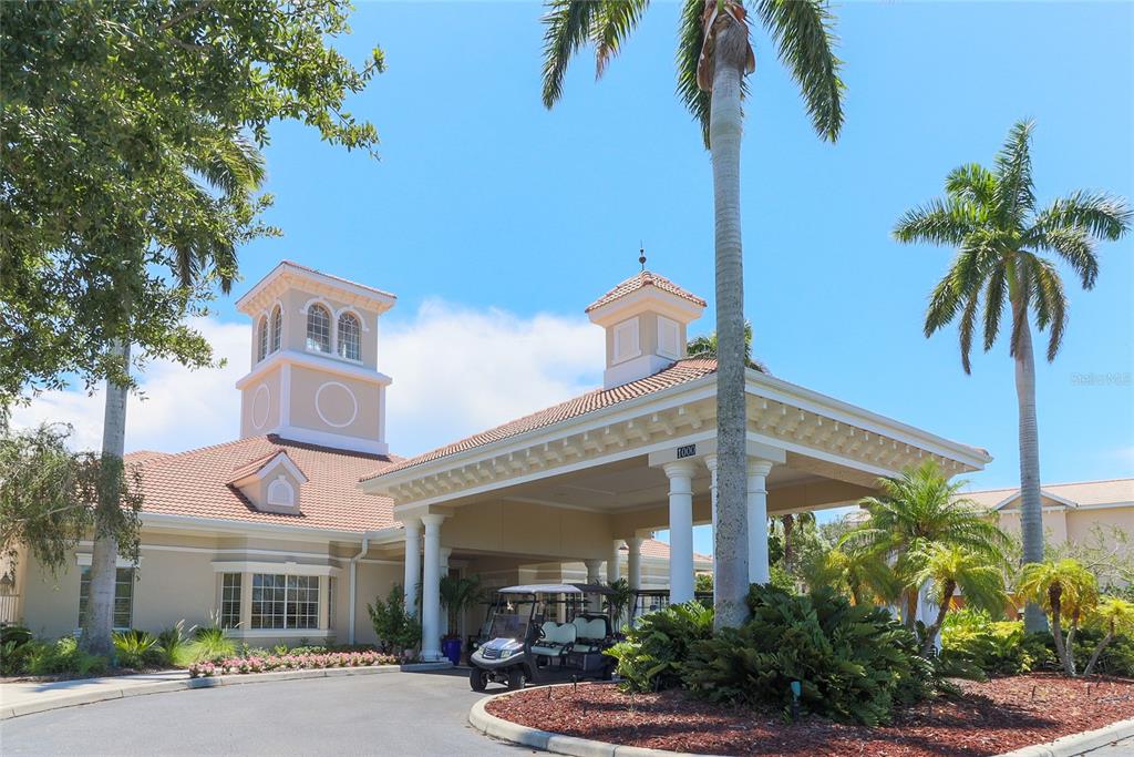 5000 Ibis Way, Unit 101 Venice, FL 34292 - Photo 25 of 39 a front view of a house with garden