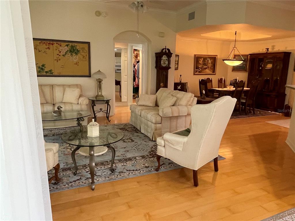 5000 Ibis Way, Unit 101 Venice, FL 34292 - Photo 3 of 39 a living room with furniture