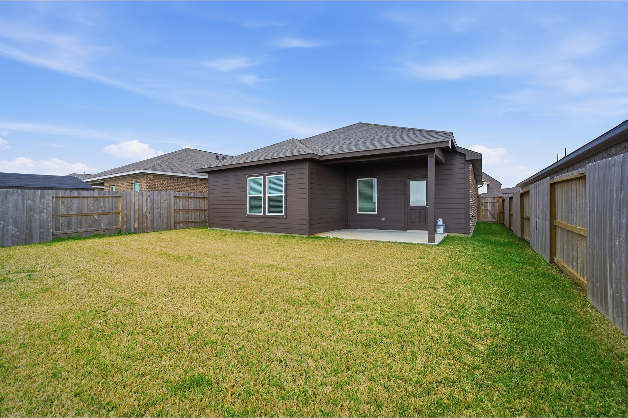 3527 Prairie Rose Trail Angleton, TX 77515 - Photo 19 of 19 a front view of a house with a garden
