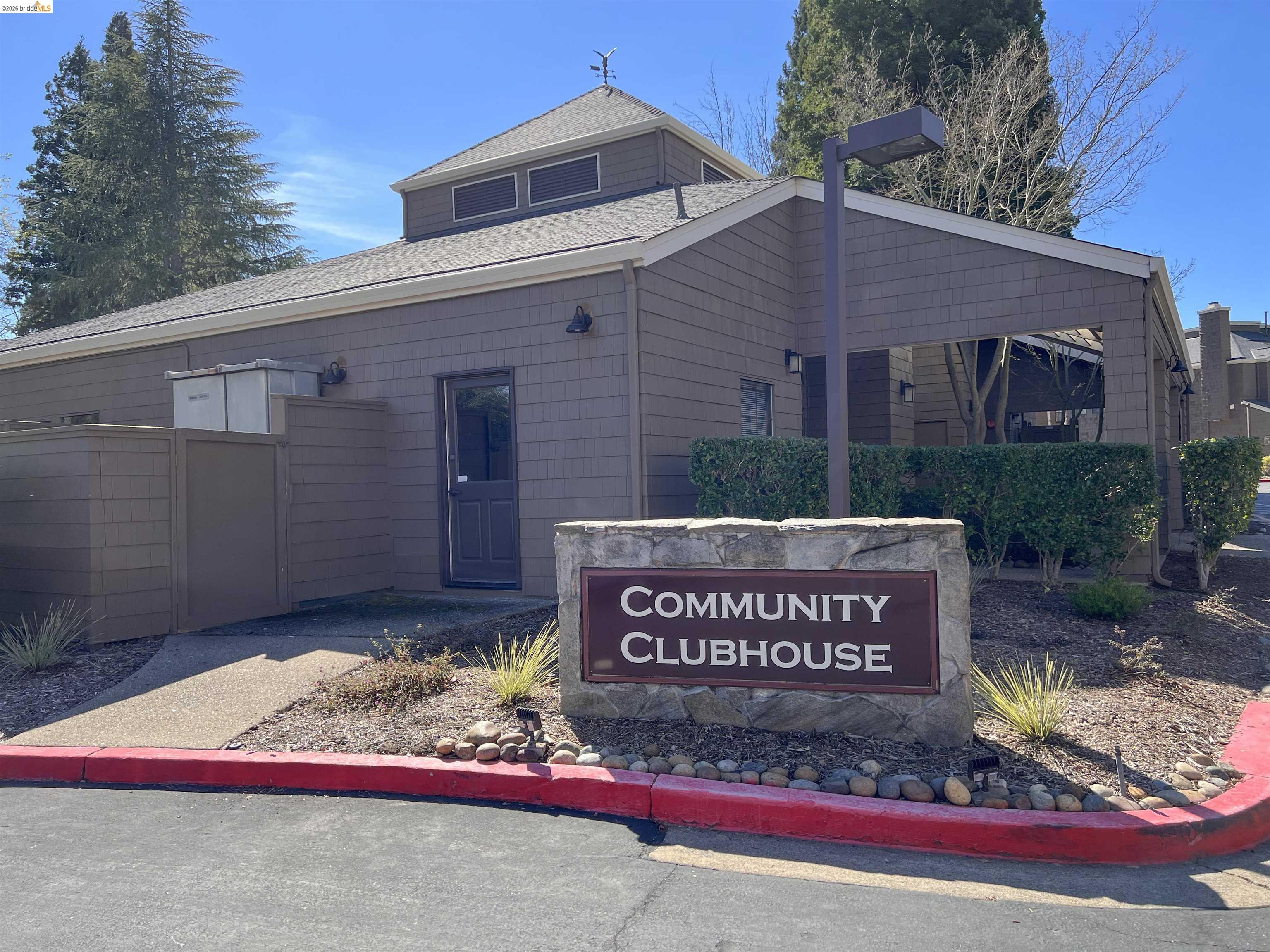 450 Pine Ridge Drive San Ramon, CA 94582 - Photo 15 of 18 a sign on the side of a building