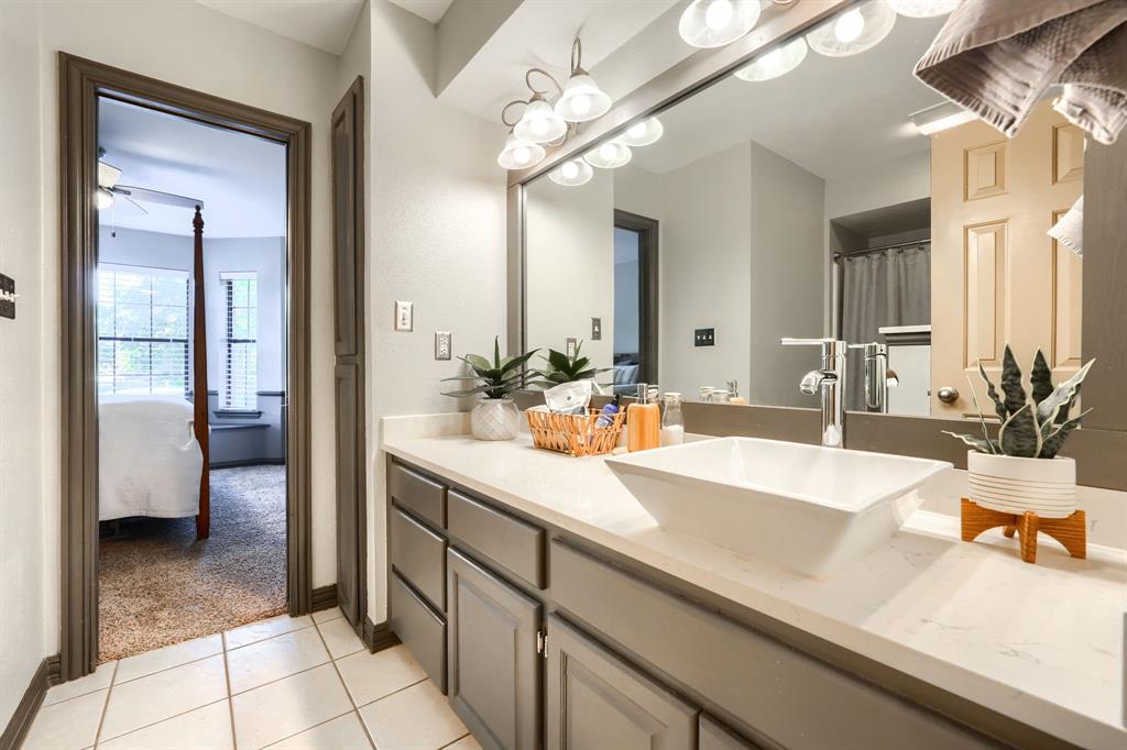 2592 Meadow Way Kaufman, TX 75142 - Photo 29 of 40 a bathroom with a sink double vanity and a mirror