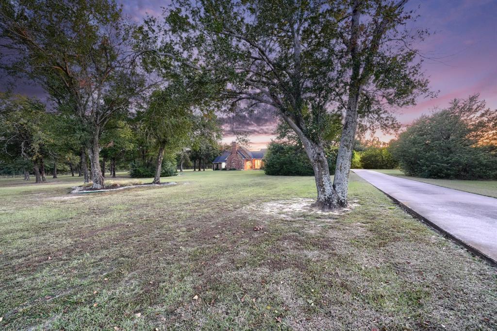 2592 Meadow Way Kaufman, TX 75142 - Photo 3 of 40 a view of outdoor space with trees