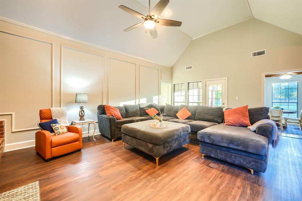 2592 Meadow Way Kaufman, TX 75142 - Photo 9 of 40 a living room with furniture and a wooden floor