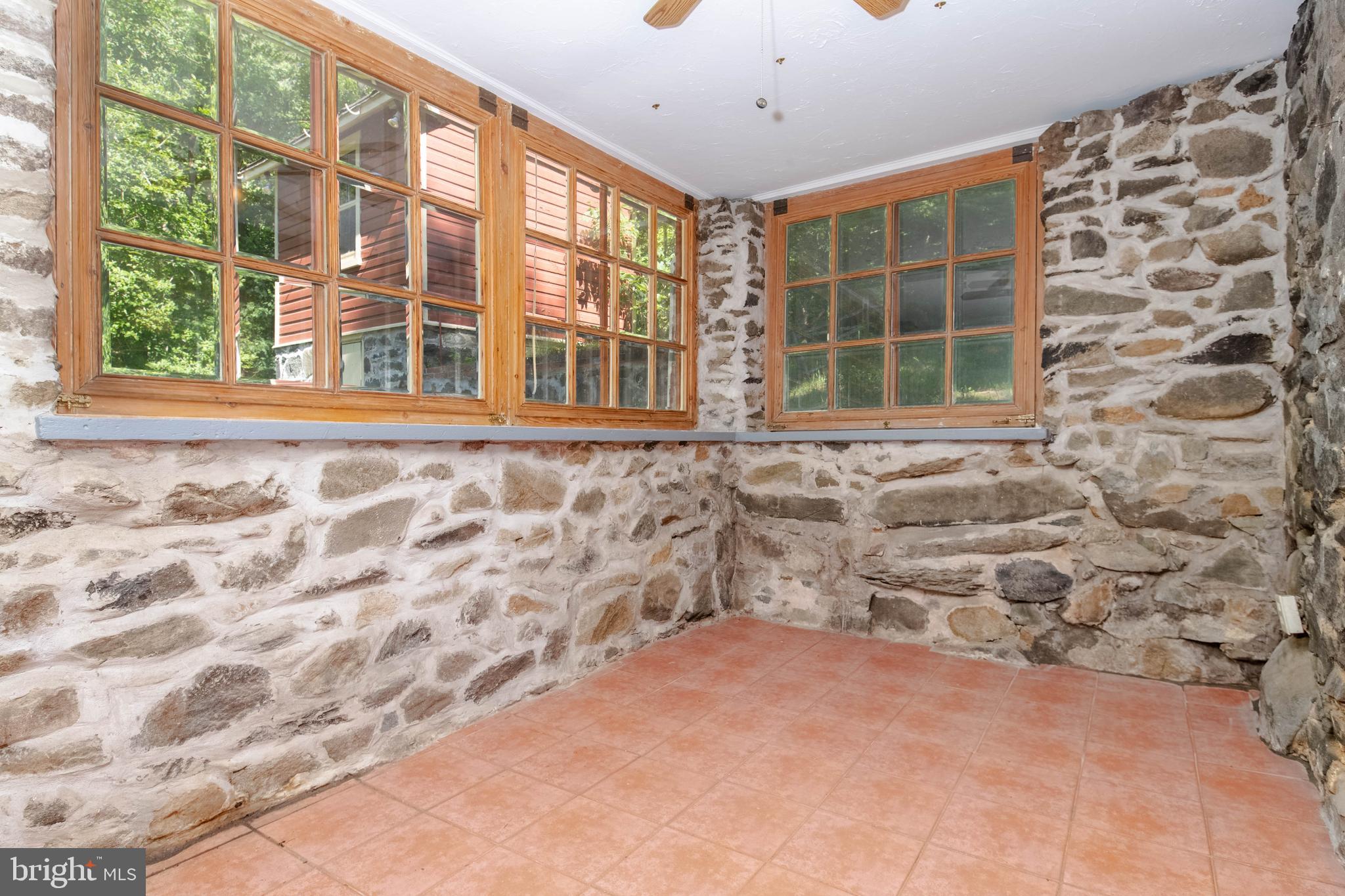 4901 Wetheredsville Road Baltimore, MD 21207 - Photo 18 of 54 Relaxing sunroom