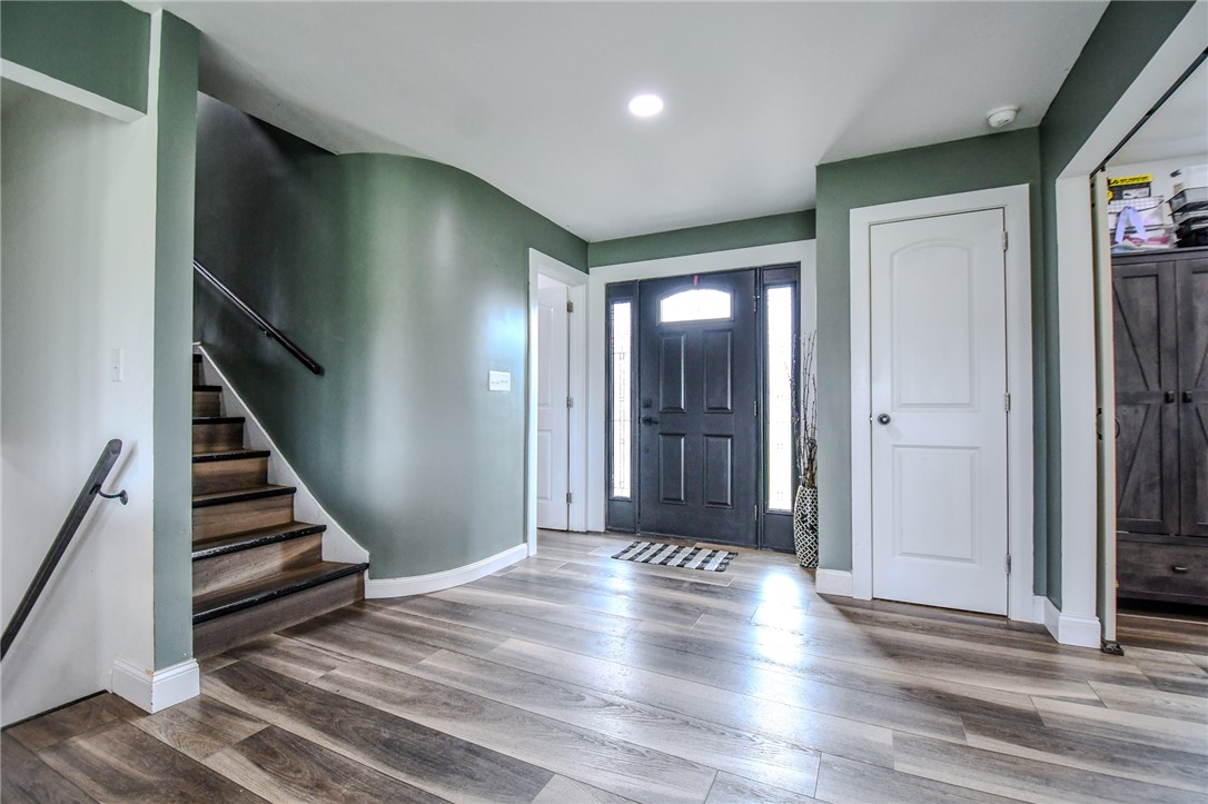 6169 Dayton Farmersville Road Dayton, OH 45417 - Photo 7 of 64 This inviting entry features durable wood flooring and a graceful staircase.