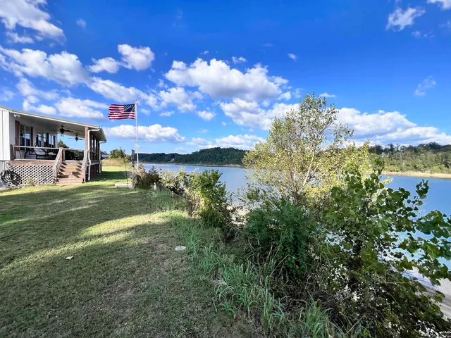 a view of a house with a big yard