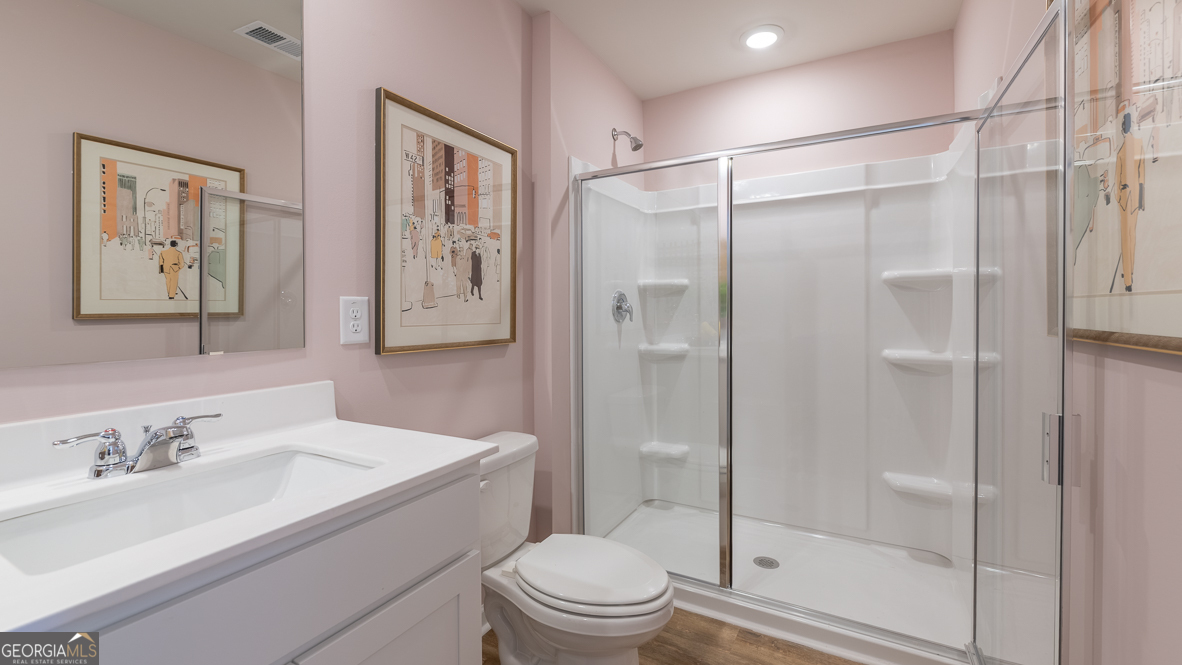 2082 Moss Hill Road Stone Mountain, GA 30088 - Photo 25 of 38 a bathroom with a sink toilet and shower