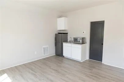 a room with storage and utility