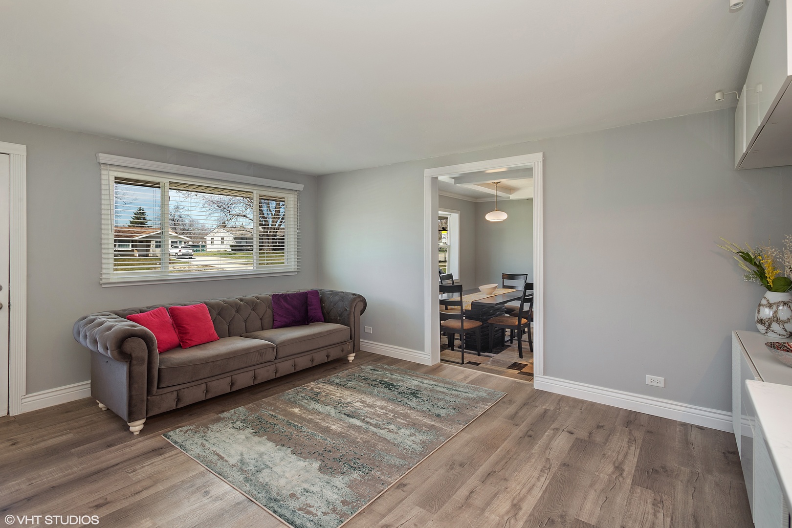 323 Springinsguth Road Schaumburg, IL 60193 - Photo 2 of 14 a living room with furniture and a window