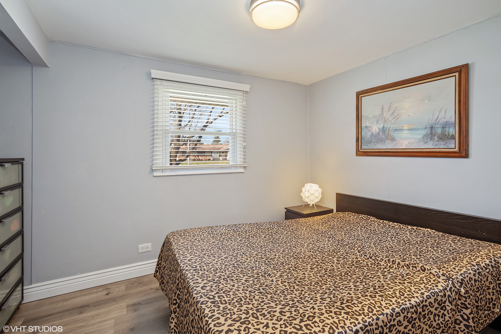 323 Springinsguth Road Schaumburg, IL 60193 - Photo 8 of 14 a bedroom with bed and a window