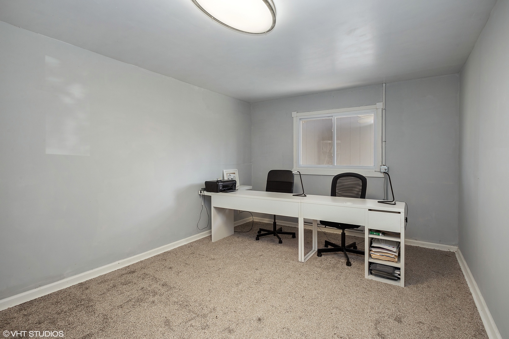 323 Springinsguth Road Schaumburg, IL 60193 - Photo 10 of 14 a view of a workspace with furniture