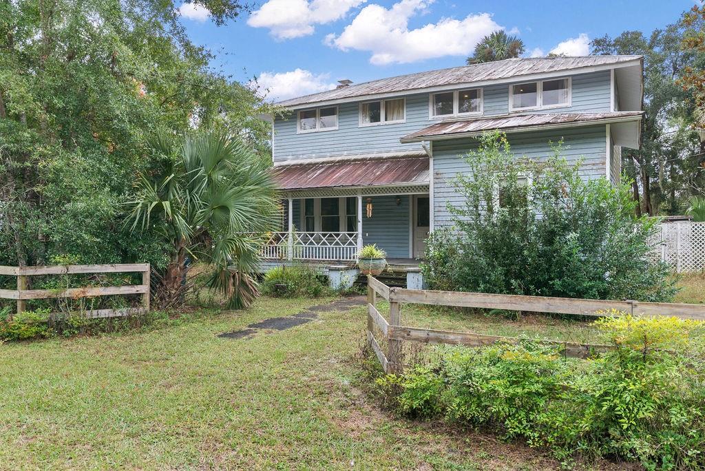 255 Lake George Road Seville, FL 32190 - Photo 1 of 1 a view of a yard in front of house