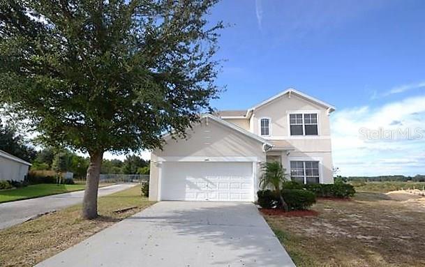 1188 Legatto Loop Dundee, FL 33838 - Photo 1 of 1 a view of a house with a yard