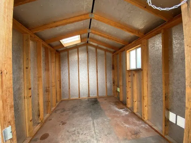 a view of a room with windows