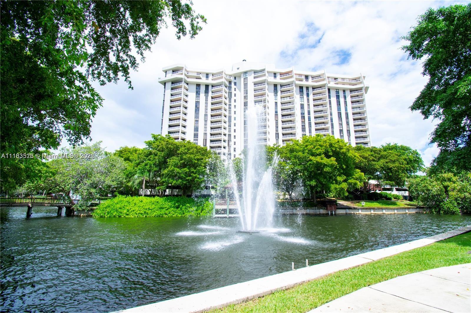 1000 Quayside Terrace, Unit 1205 Miami, FL 33138 - Photo 1 of 12 a view of a lake with a building in the background