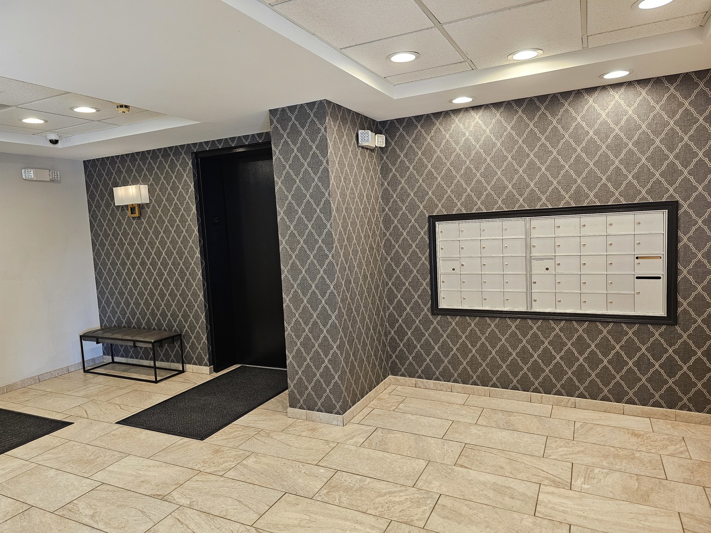405 West Front Street, Unit 3207 Wheaton, IL 60187 - Photo 12 of 16 a bathroom with a bathtub and a shower