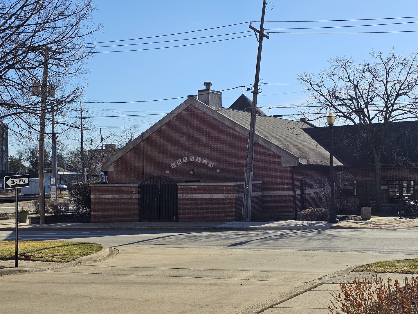 405 West Front Street, Unit 3207 Wheaton, IL 60187 - Photo 15 of 16 a view of a house with a swimming pool