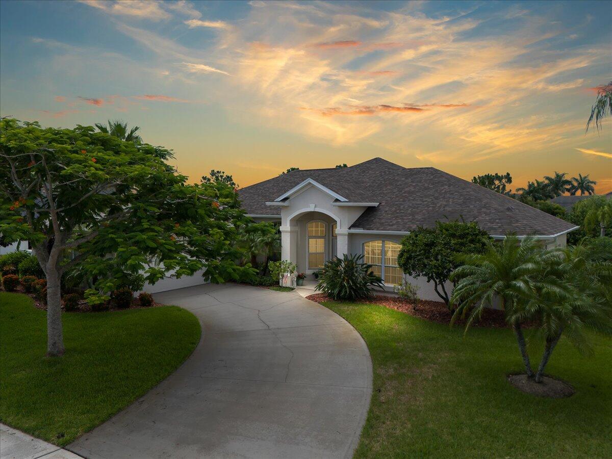4300 Stoney Point Road Melbourne, FL 32940 - Photo 2 of 37 a front view of a house with garden