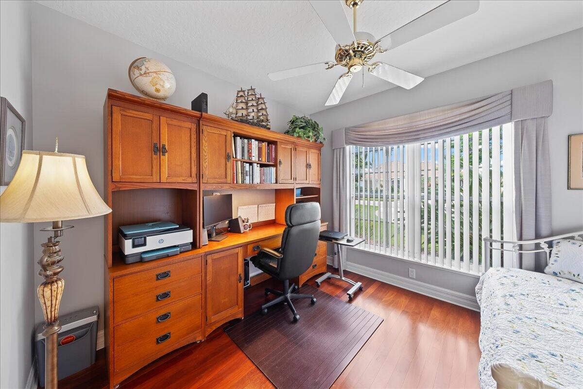 4300 Stoney Point Road Melbourne, FL 32940 - Photo 25 of 37 a bedroom with furniture and a window