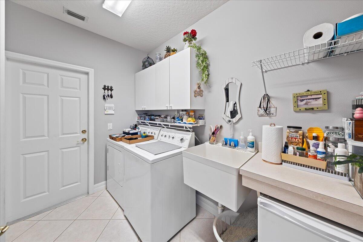 4300 Stoney Point Road Melbourne, FL 32940 - Photo 26 of 37 a room with storage and utility