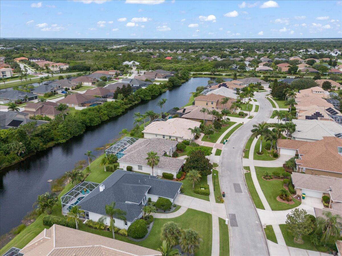 4300 Stoney Point Road Melbourne, FL 32940 - Photo 32 of 37 an aerial view of residential houses with outdoor space and lake view