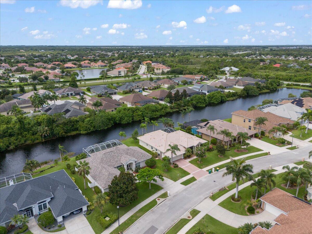 4300 Stoney Point Road Melbourne, FL 32940 - Photo 33 of 37 an aerial view of a house with a lake view