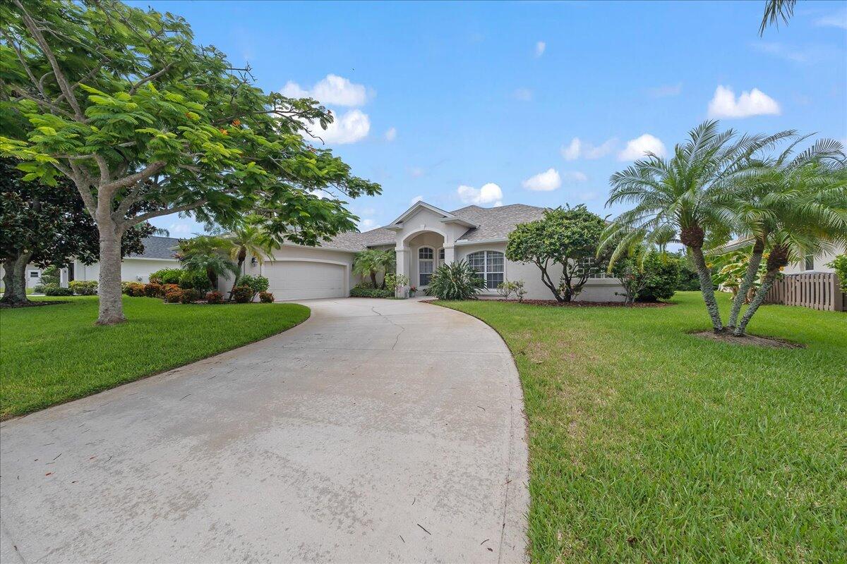 4300 Stoney Point Road Melbourne, FL 32940 - Photo 37 of 37 a front view of house with yard and green space