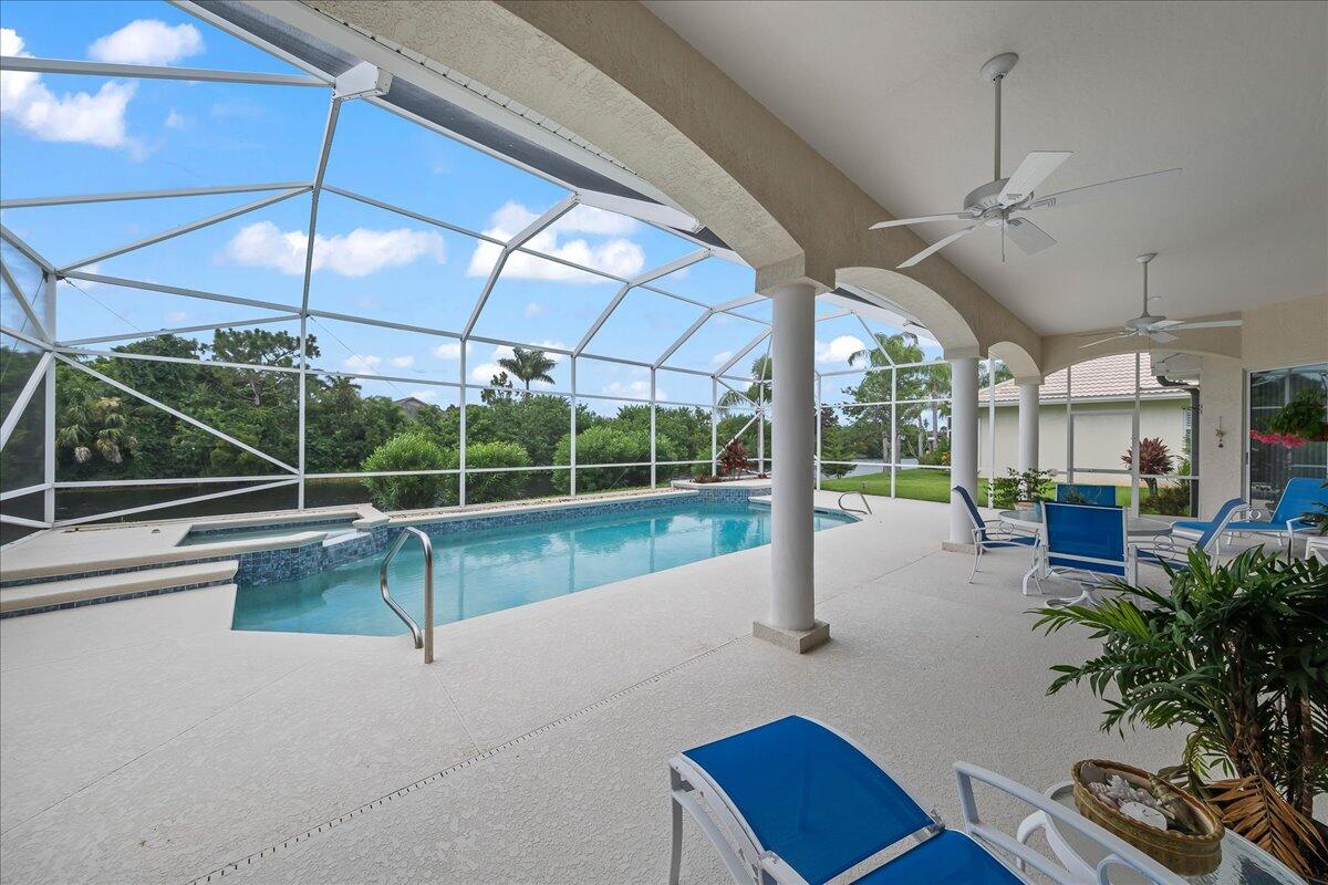 4300 Stoney Point Road Melbourne, FL 32940 - Photo 5 of 37 a view of a living room and floor to ceiling window