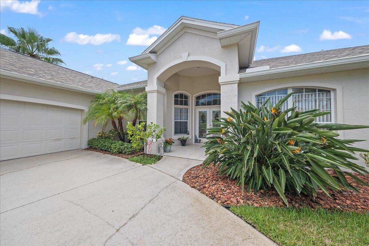 4300 Stoney Point Road Melbourne, FL 32940 - Photo 7 of 37 a front view of a house with garden