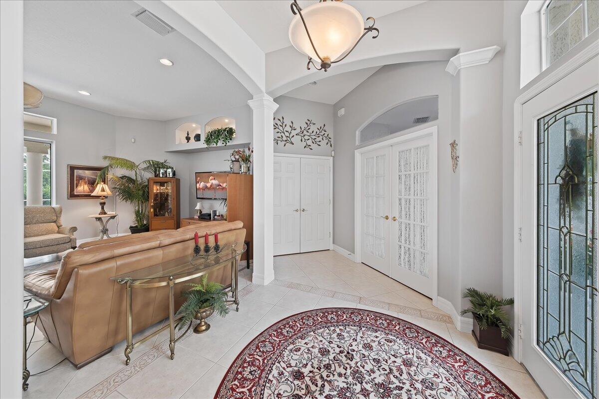 4300 Stoney Point Road Melbourne, FL 32940 - Photo 9 of 37 a room with furniture and entryway