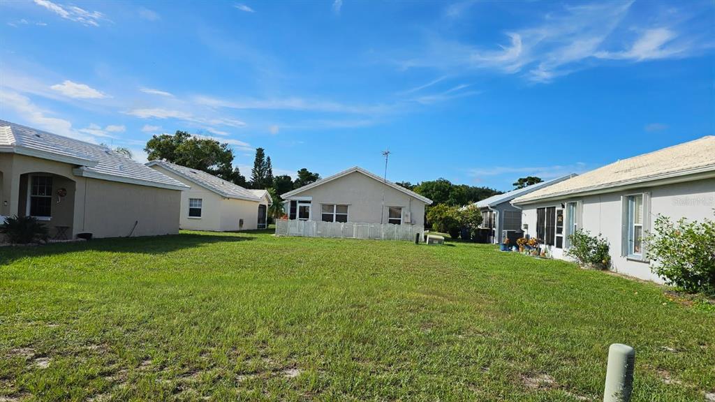 1941 Myrtle Court Northeast Palm Bay, FL 32905 - Photo 4 of 5 a front view of house with yard and green space