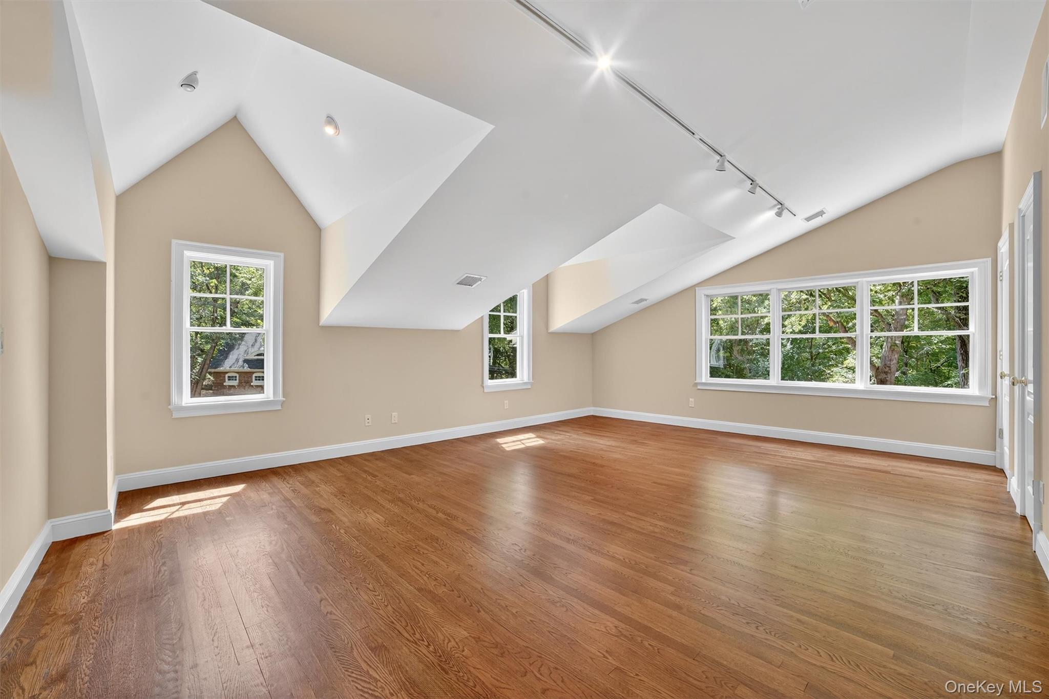 6 Todd Road Katonah, NY 10536 - Photo 39 of 50 Bonus room with vaulted ceiling and light wood-style flooring