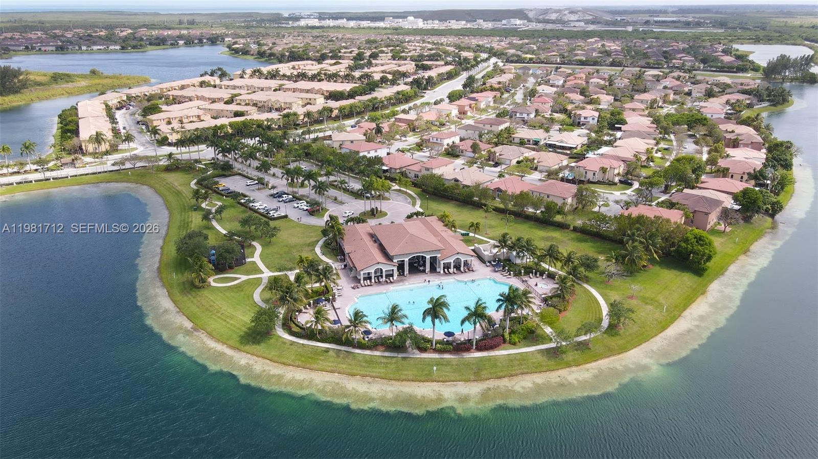 9267 Southwest 227th Street, Unit 2 Miami, FL 33190 - Photo 17 of 24 an aerial view of a house with a swimming pool