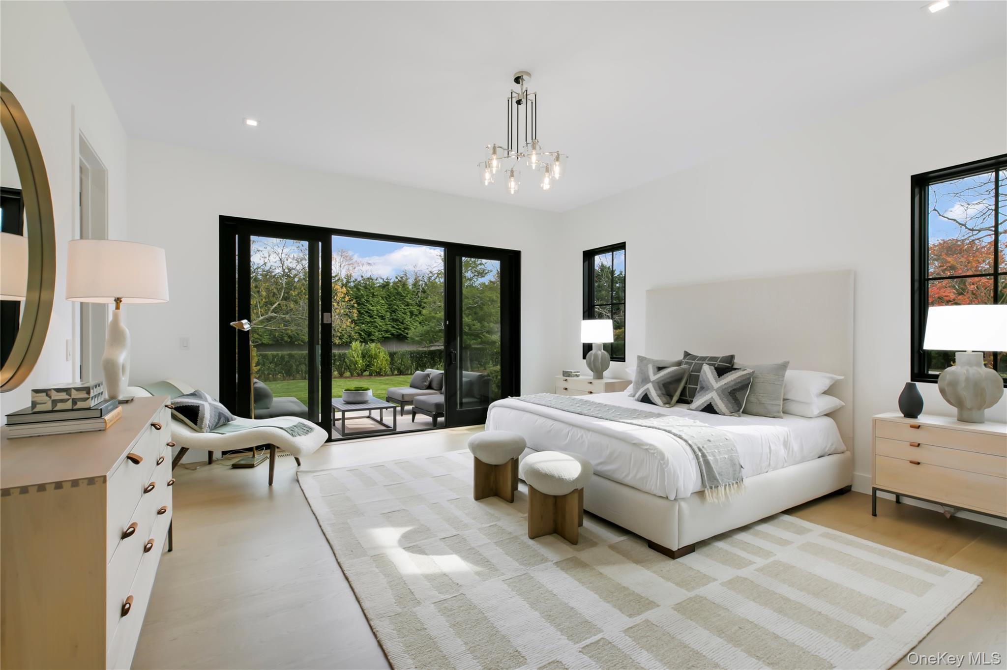 158 Cobb Road Water Mill, NY 11976 - Photo 14 of 43 Bedroom featuring recessed lighting, access to outside, and light wood-style flooring