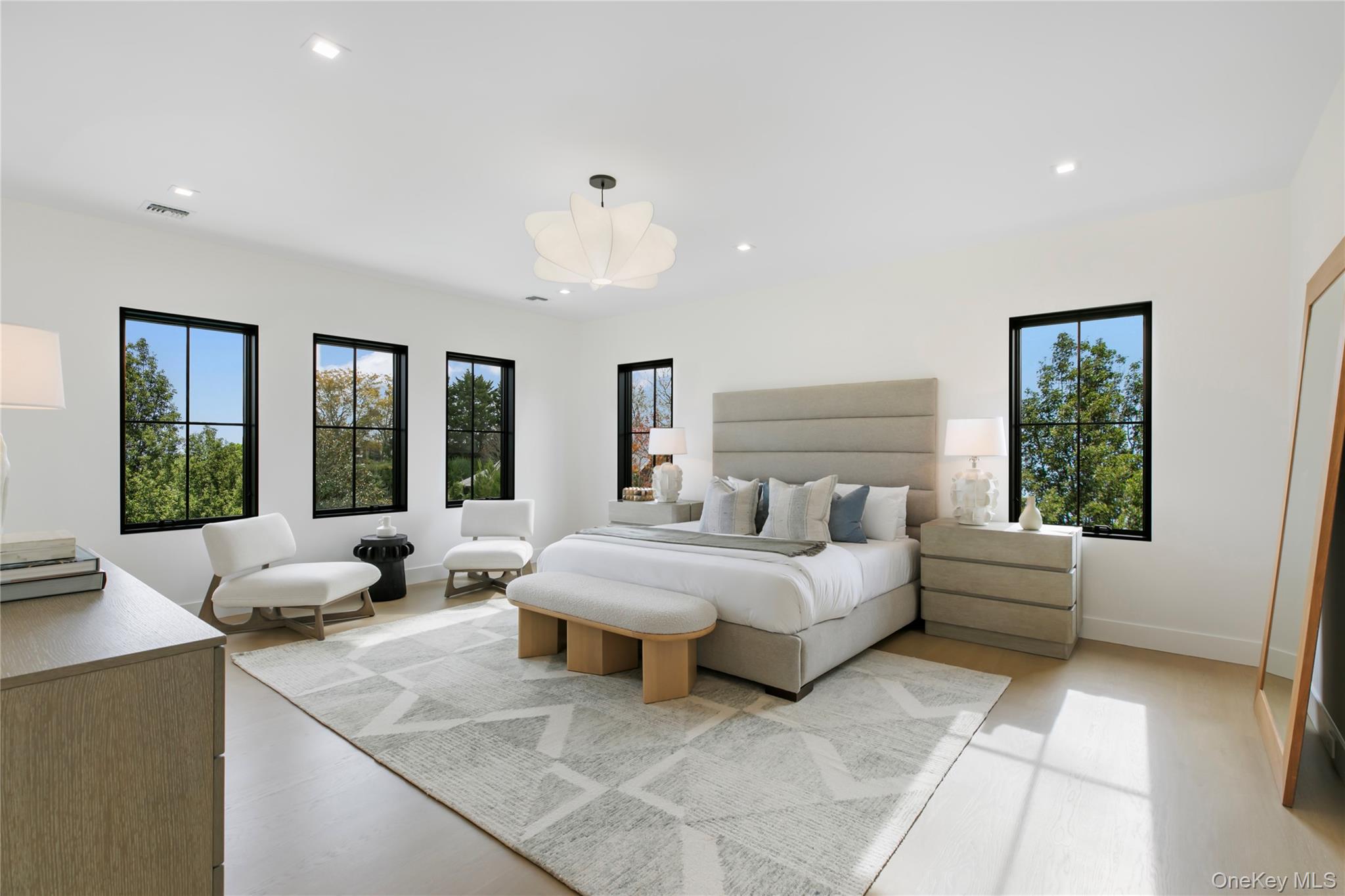 158 Cobb Road Water Mill, NY 11976 - Photo 19 of 43 Bedroom featuring multiple windows, recessed lighting, and light wood finished floors