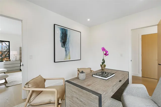 a view of a workspace with furniture